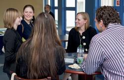 Students talk with Liz Kennedy '04, center, after the Seminar on Success.