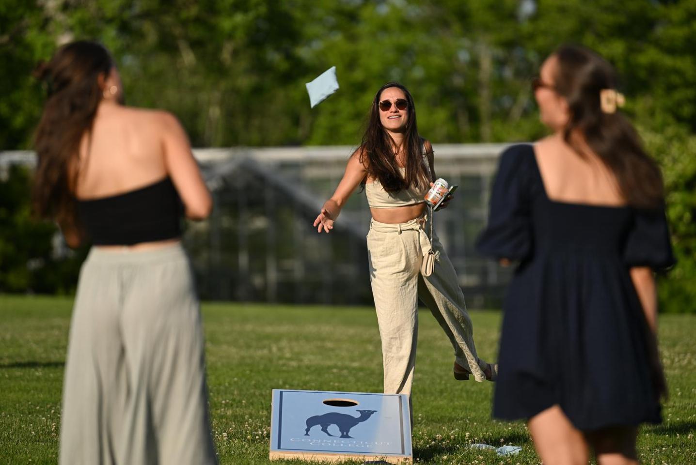 Alumni playing cornhole at Reunion 2024